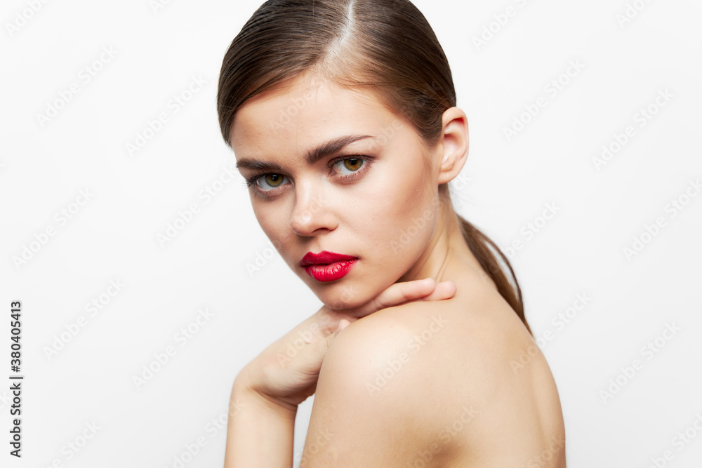 Fototapeta premium woman with flower charm of an elegant style red lips