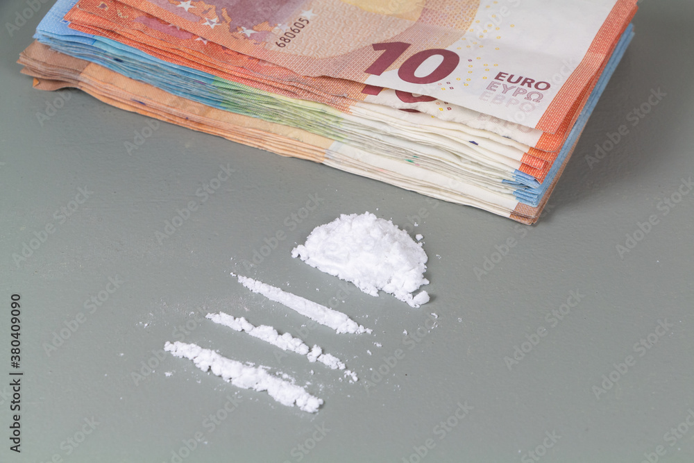 Cocaine lines and heap of euros banknotes Stock Photo Adobe Stock
