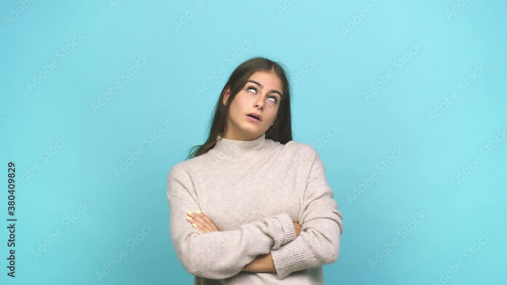 Young caucasian woman tired of a repetitive task Young caucasian woman tired of a repetitive task
