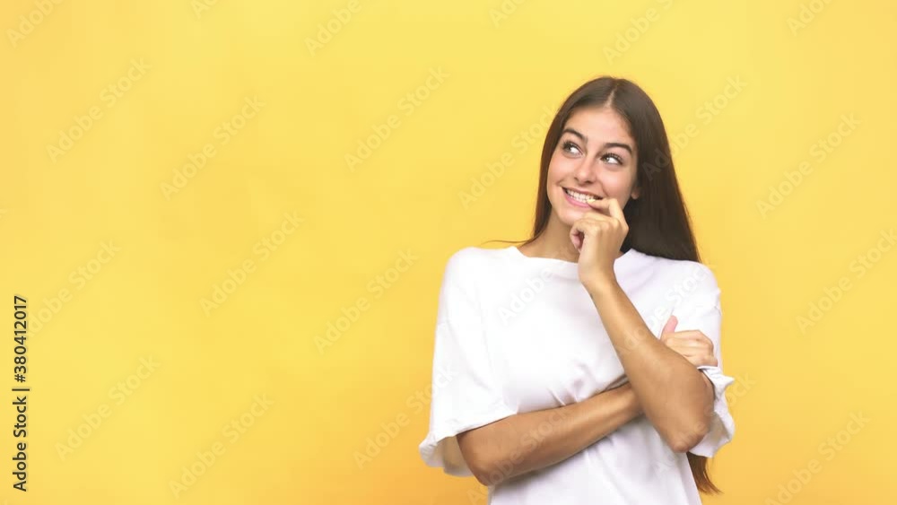 Young caucasian woman relaxed thinking about something looking at a copy space Young caucasian woman relaxed thinking about something looking at a copy space