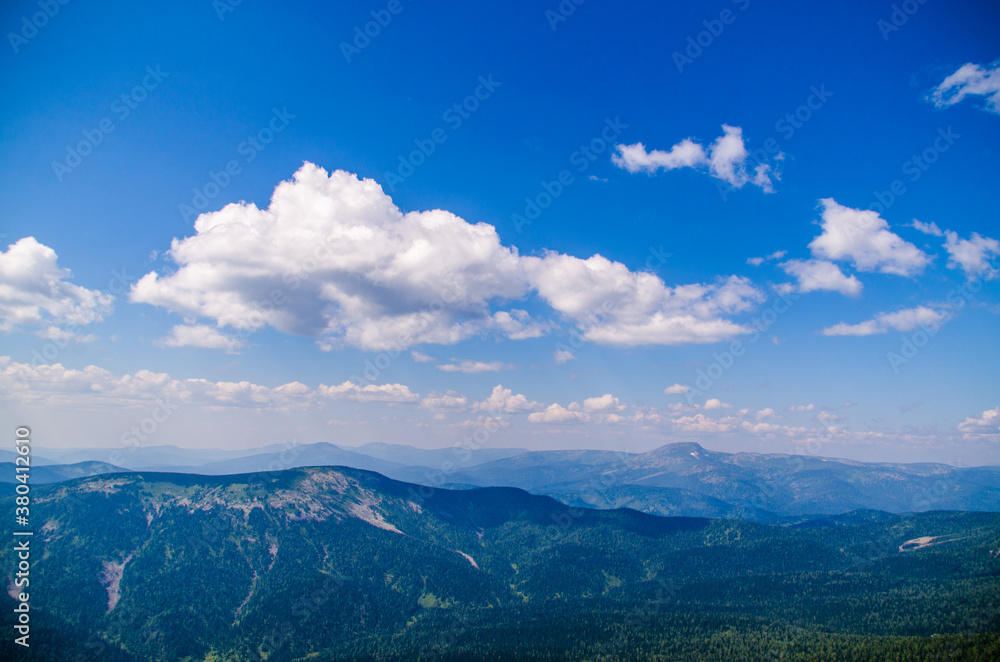 Obraz premium View from high mountain. clouds in the sky