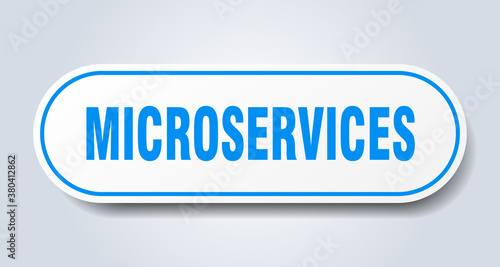microservices sign. rounded isolated button. white sticker