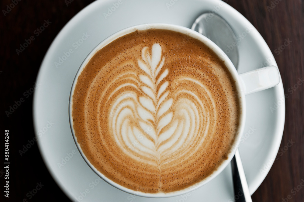 flat white coffee with latte art flat white coffee with latte art
