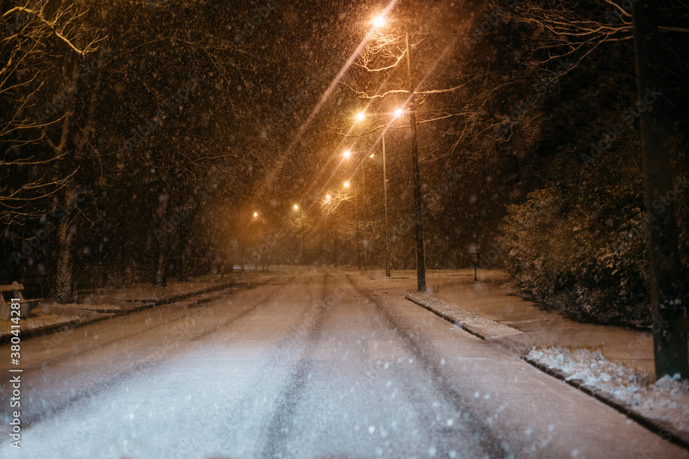 Winter blizzard in a snow-covered street Winter blizzard in a snow-covered street