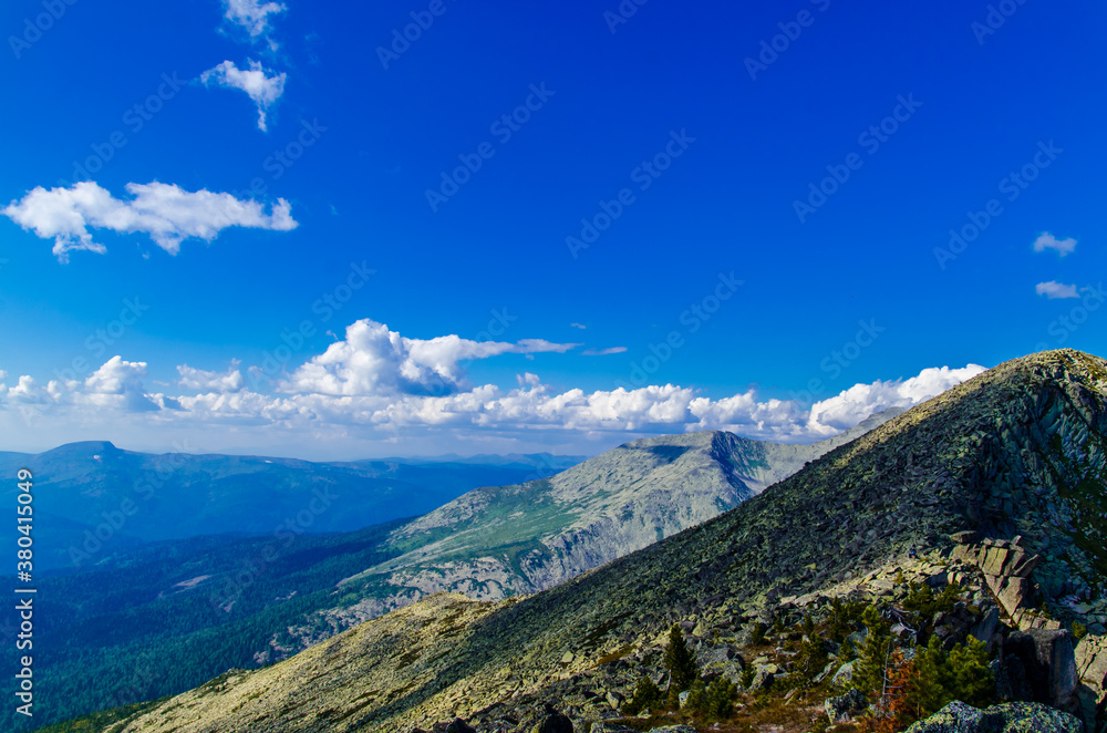 Fototapeta premium View from high mountain. clouds in the sky
