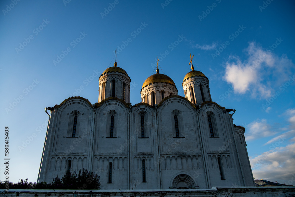 old white-stone temples against the backdrop of sunset old white-stone temples against the backdrop of sunset