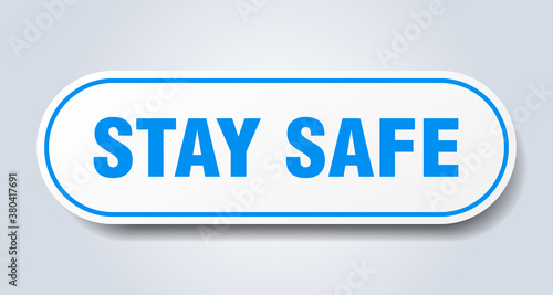 stay safe sign. rounded isolated button. white sticker