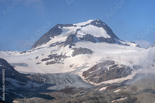 The "Punta d'arbola" with its glaciers, one of the most important peaks of the formazza valley, in the Alps, near the town of Riale, Italy - July 2020.