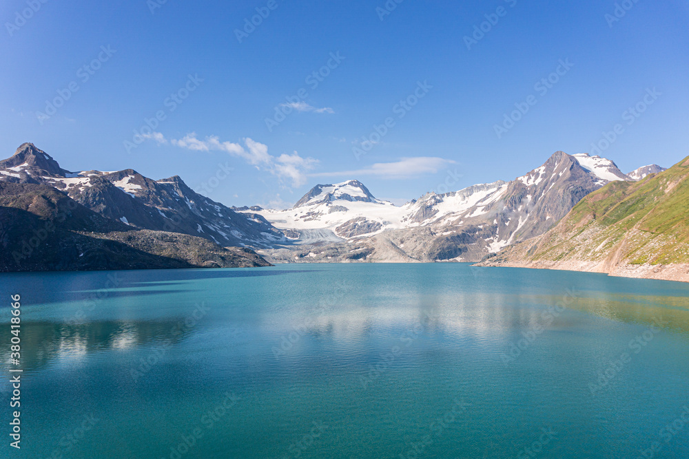 The lake of sabbioni, between the alps of the val formazza, during a summer day, near the town of Riale, Italy - July 2020.