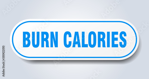 burn calories sign. rounded isolated button. white sticker