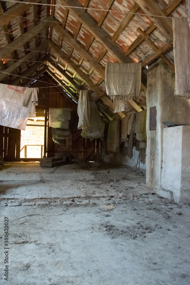 Old dilapidated barn of wood and brick in the village Old dilapidated barn of wood and brick in the village