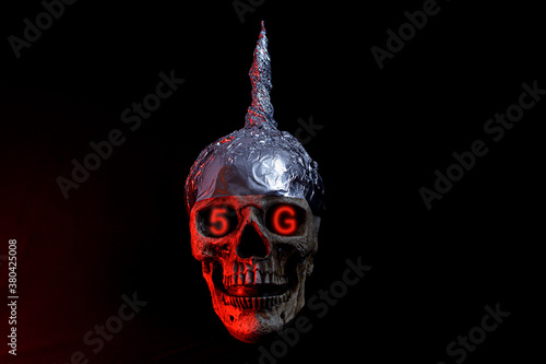 skull wearing a tinfoil hat 5g conspiracy
