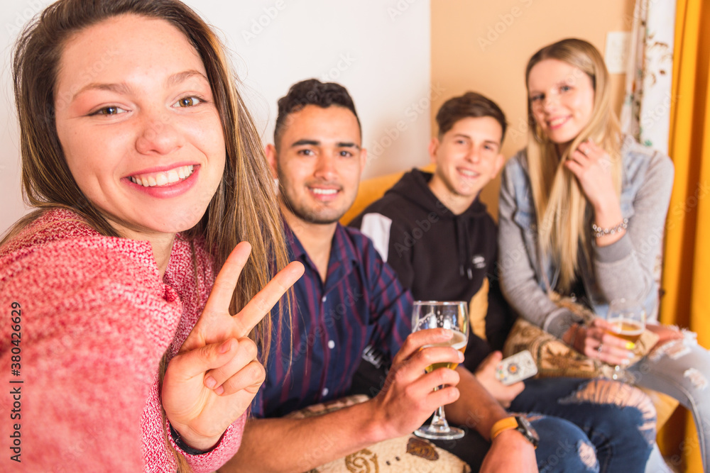 Group of friends enjoying the moment. Young friends take a picture. the focus is on the first person. Group of friends enjoying the moment. Young friends take a picture. the focus is on the first person.