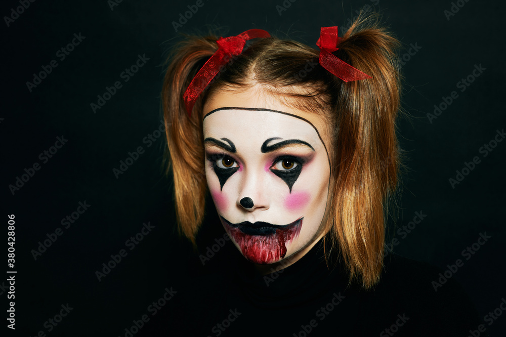 Fototapeta premium Close up portrait of young teenage girl with Halloween makeup