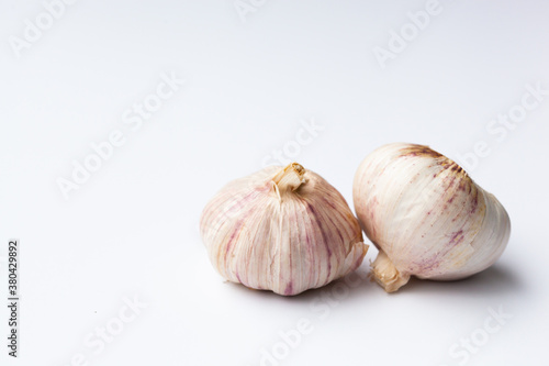 two head of garlic isolated on white background