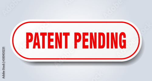 patent pending sign. rounded isolated button. white sticker