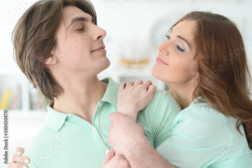 Portrait of happy young couple in love