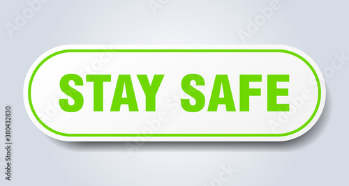 stay safe sign. rounded isolated button. white sticker