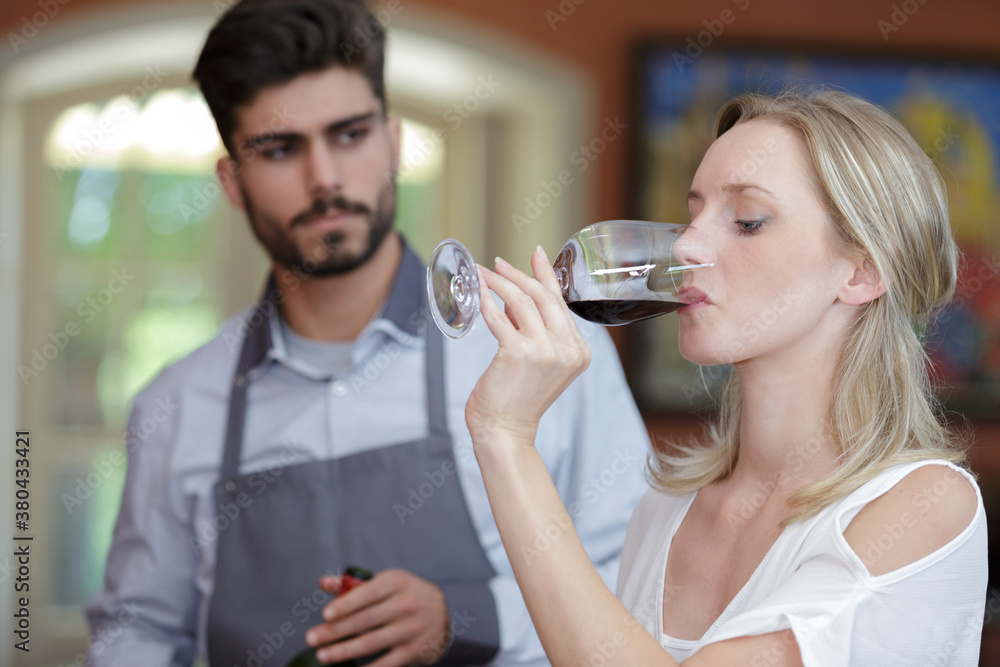 people degustating wines in a wine tasting event people degustating wines in a wine tasting event