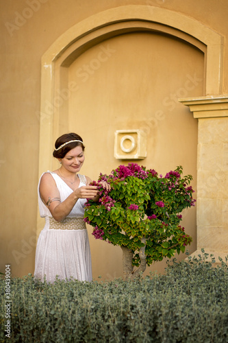 Girl in Greek style dress.