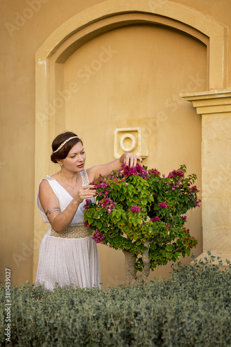 Girl in Greek style dress.