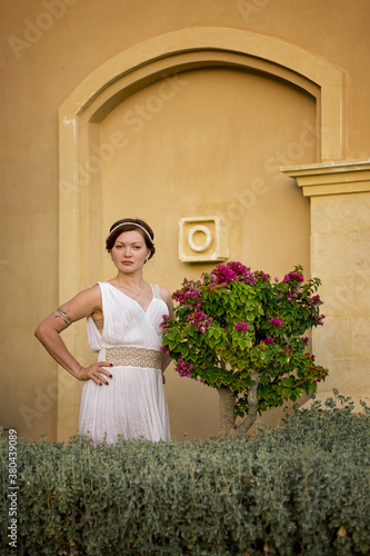 Girl in Greek style dress.