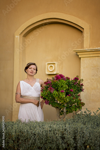 Girl in Greek style dress.