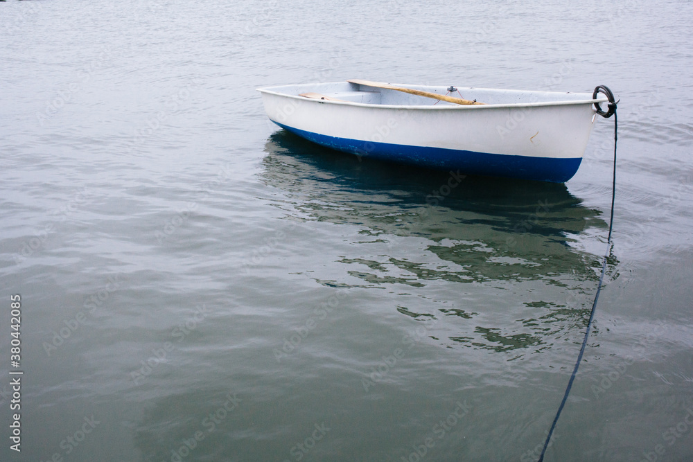 An isolated boat in the ocean or lake. An isolated boat in the ocean or lake.