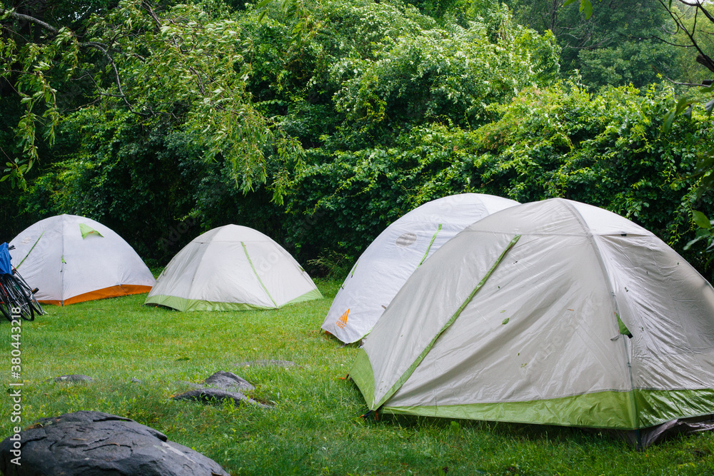 Tents in the rain at a camping ground. Tents in the rain at a camping ground.