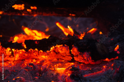 embers burn down in a hardwood fire