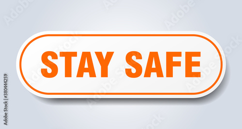 stay safe sign. rounded isolated button. white sticker