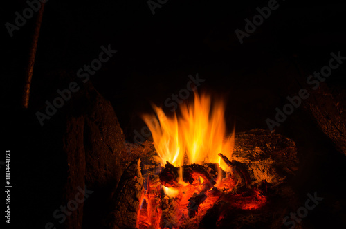 embers burn down in a hardwood fire