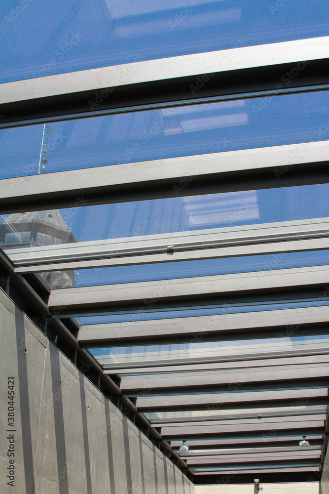 Modern glass and steel architecture of a roof from the inside. Modern glass and steel architecture of a roof from the inside.