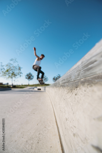 Skater grinding on curb - out of focus photo