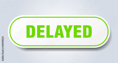 delayed sign. rounded isolated button. white sticker