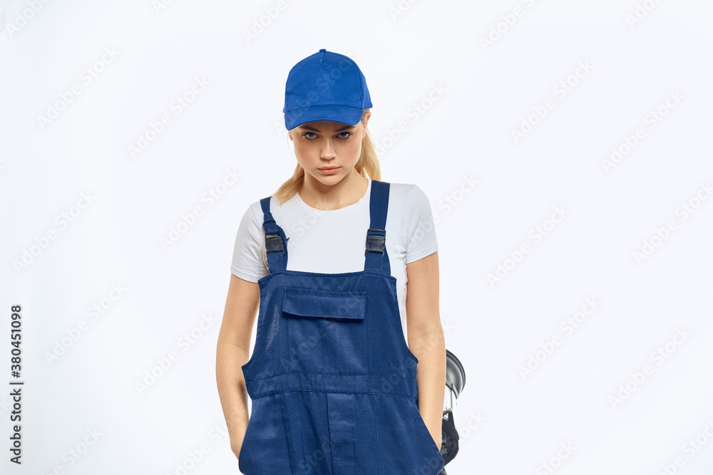 Woman in working uniform blue cap delivery courier delivery service Woman in working uniform blue cap delivery courier delivery service