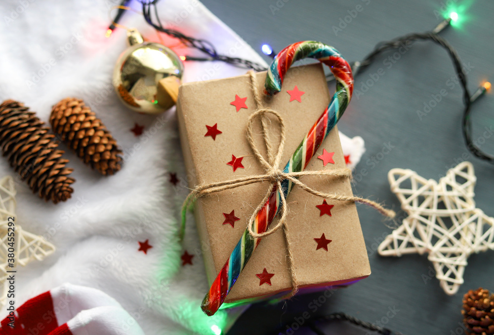 Christmas or new year gift in a decorated box. Selective focus. Christmas or new year gift in a decorated box. Selective focus.