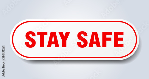 stay safe sign. rounded isolated button. white sticker