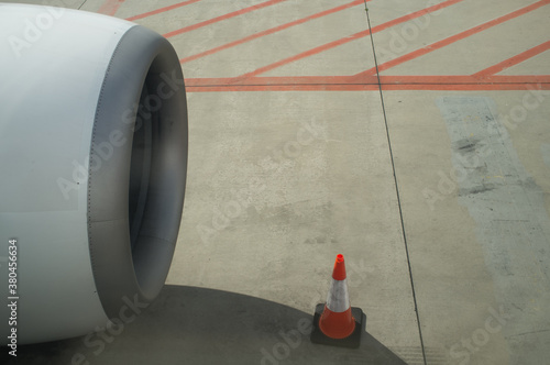 Airplane engine and cone photo