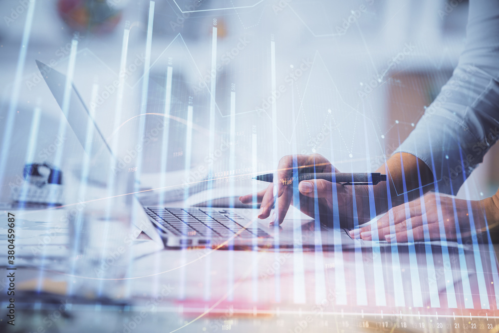 Double exposure of woman hands typing on computer and forex chart hologram drawing. Stock market invest concept. Double exposure of woman hands typing on computer and forex chart hologram drawing. Stock market invest concept.