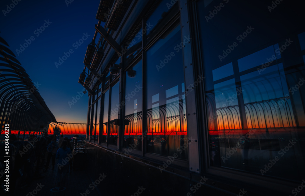 sunset reflections in skyscraper glass colors 