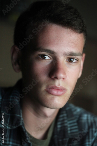 Portrait Of Italian Boy Wearing Plaid photo