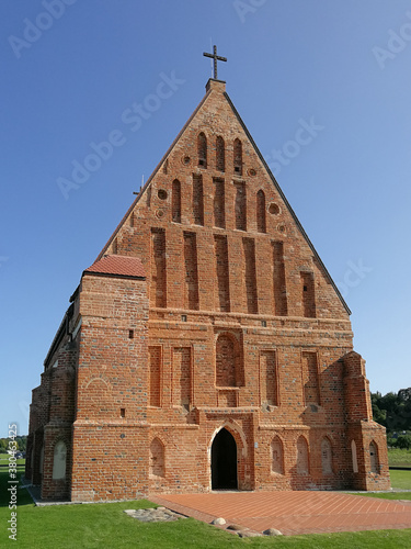 Old church of st. John the baptist in Zapyskis, Lithuania photo