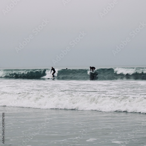 surfing at the beach