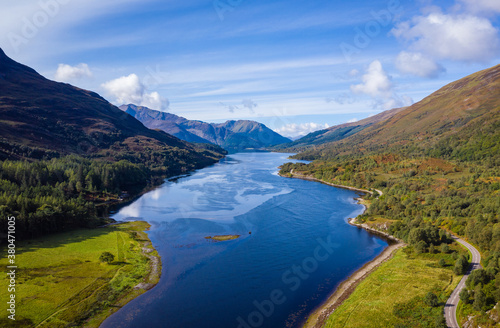 aerial view of loch linnhe in summer near duror and ballachulish and glencoe in the argyll region of the highlands of scotland showing blue water and green fertile coast line