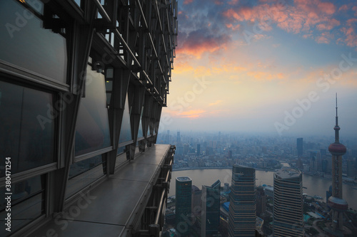 Bird view at Shanghai China. Skyscraper under architectural in foreground. photo