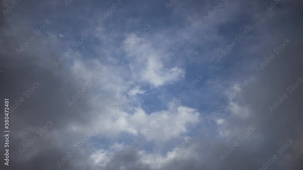 Storm clouds covering the blue sky, time lapse Storm clouds covering the blue sky, time lapse
