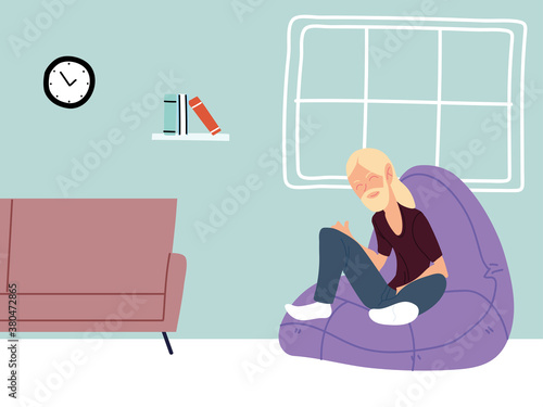 man working remotely from her home