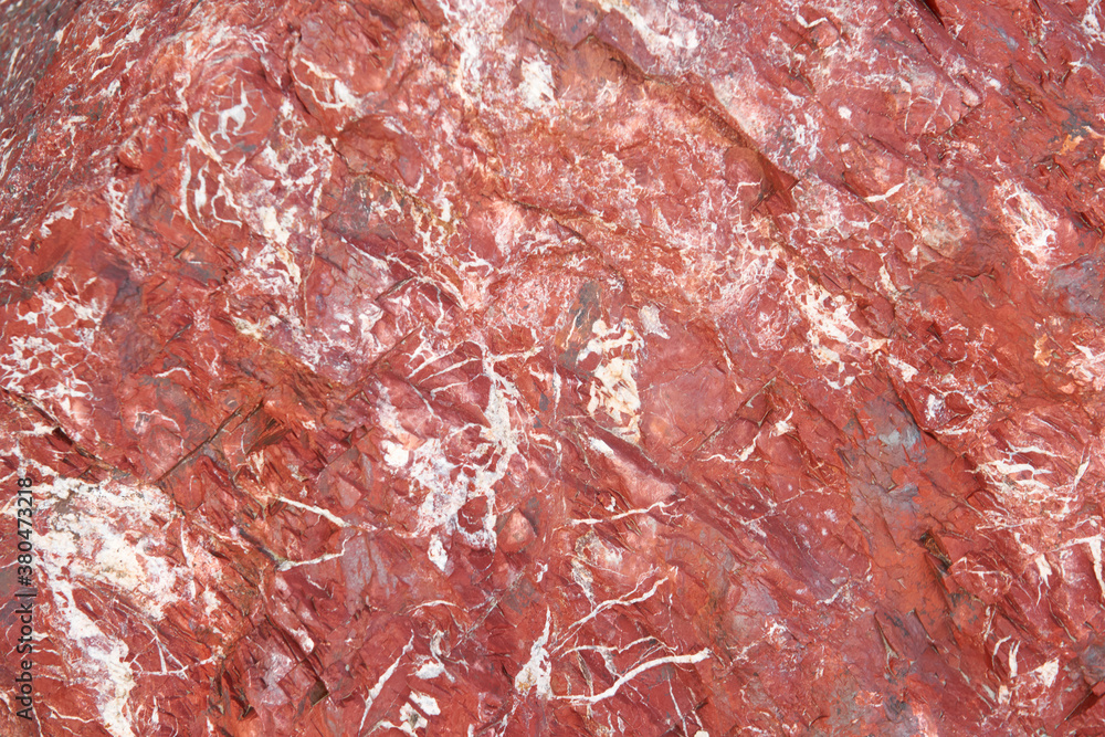 Red background, stone with veins. Natural stone surfaces, wallpaper and wallpaper. Red background, stone with veins. Natural stone surfaces, wallpaper and wallpaper.