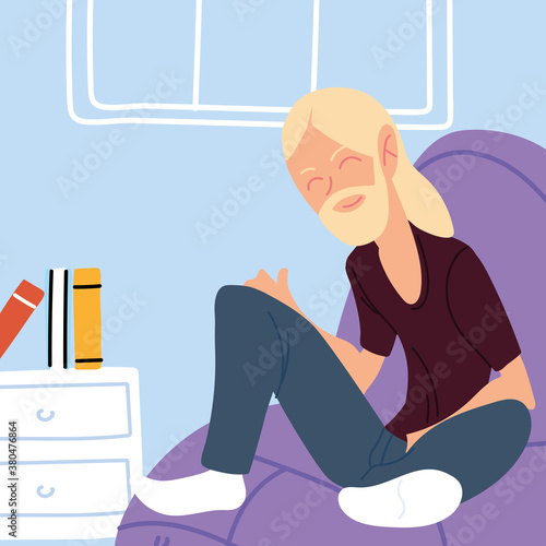 man working remotely from her home